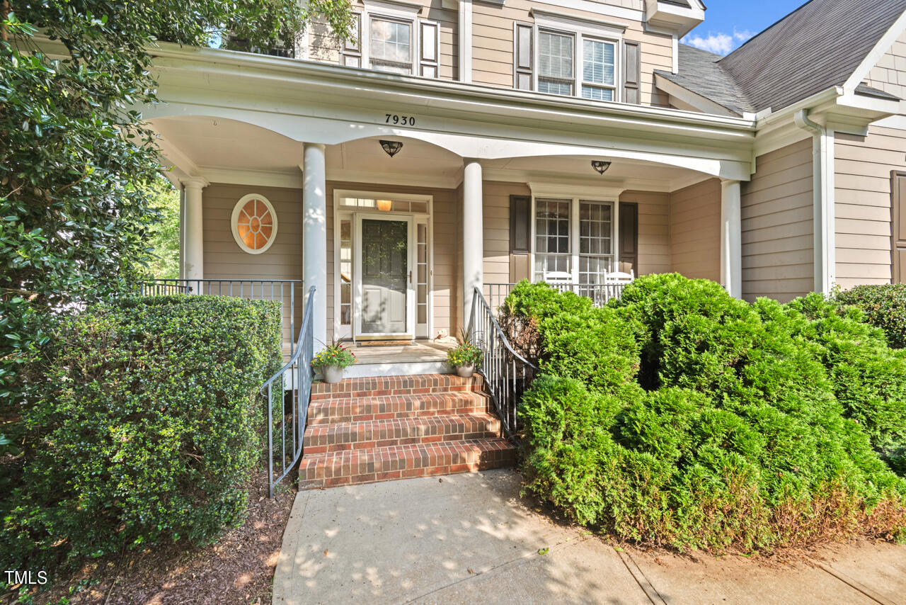 7930 Pine Timber Drive Raleigh, NC 27613 - Photo 2 of 57 a view of a house with potted plants