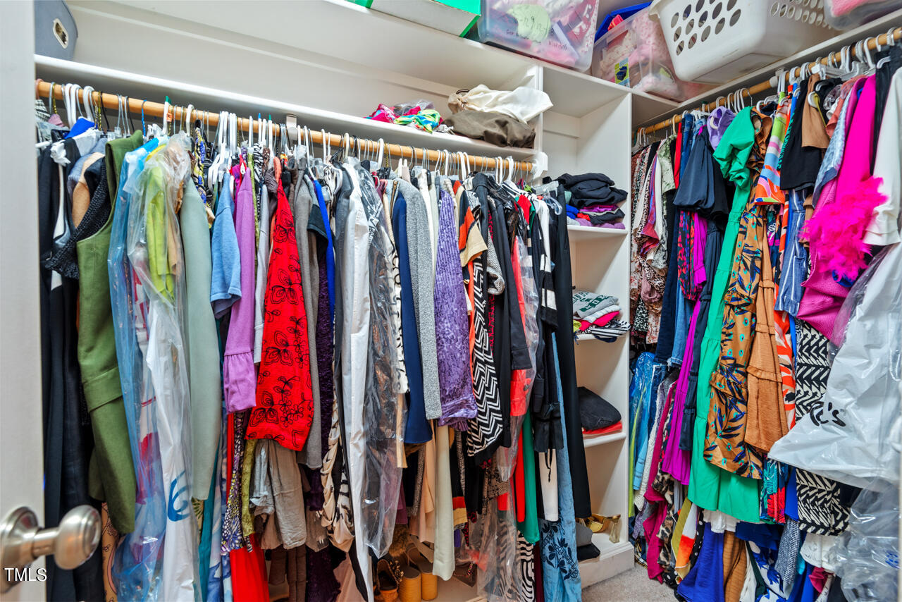 7930 Pine Timber Drive Raleigh, NC 27613 - Photo 35 of 57 a view of walk in closet with clothes