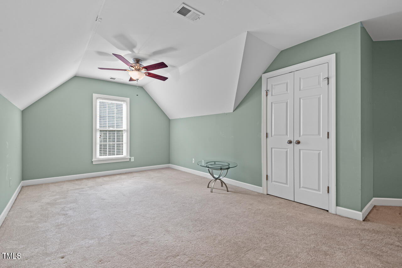 7930 Pine Timber Drive Raleigh, NC 27613 - Photo 43 of 57 a view of an empty room with a window