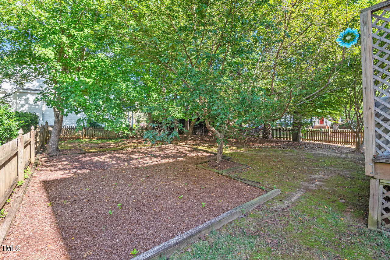 7930 Pine Timber Drive Raleigh, NC 27613 - Photo 50 of 57 a view of a tree in a park