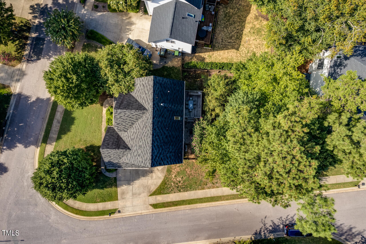 7930 Pine Timber Drive Raleigh, NC 27613 - Photo 57 of 57 an aerial view of a house with a yard and garden