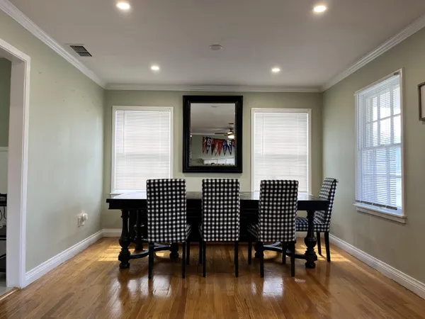 a kitchen with cabinets and white stainless steel appliances