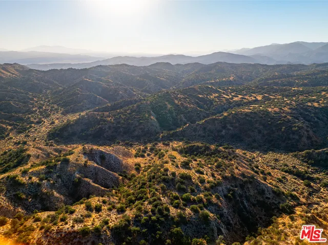 a view of an outdoor space and a yard