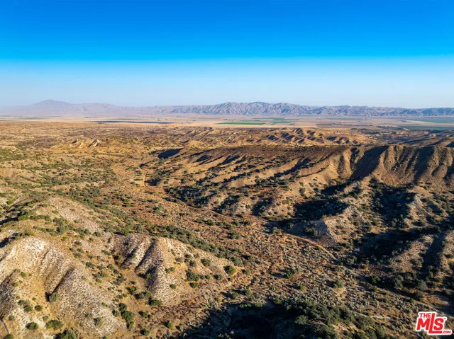 a view of a house with a mountain