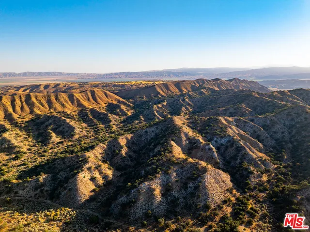 a view of a city with mountains in the background