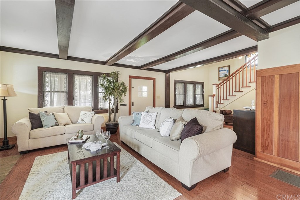 402 Virginia Street El Segundo, CA 90245 - Photo 3 of 22 a living room with furniture and a large window