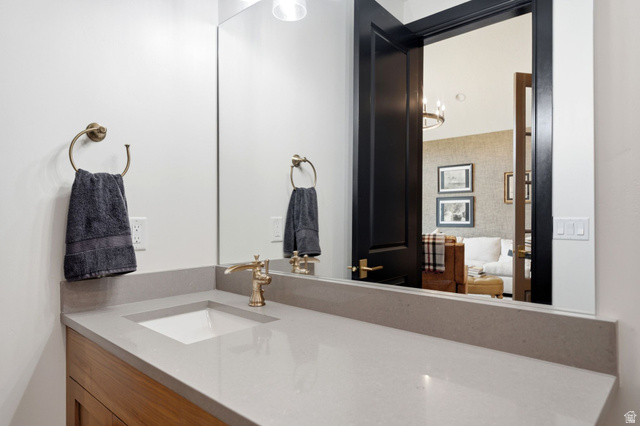71 Farm Road Midway, UT 84049 - Photo 63 of 92 Bathroom vanity featuring a light gray countertop with an integrated rectangular sink