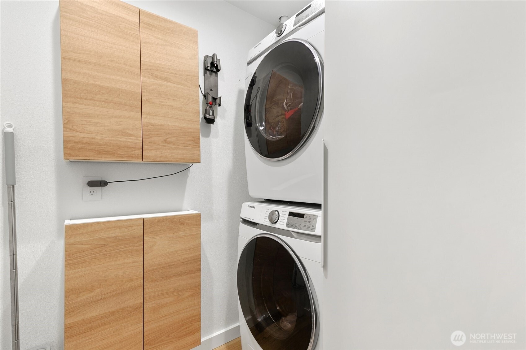 335 Heather Road, Unit 208 Everett, WA 98203 - Photo 11 of 15 a close view of a utility room with dryer and washer