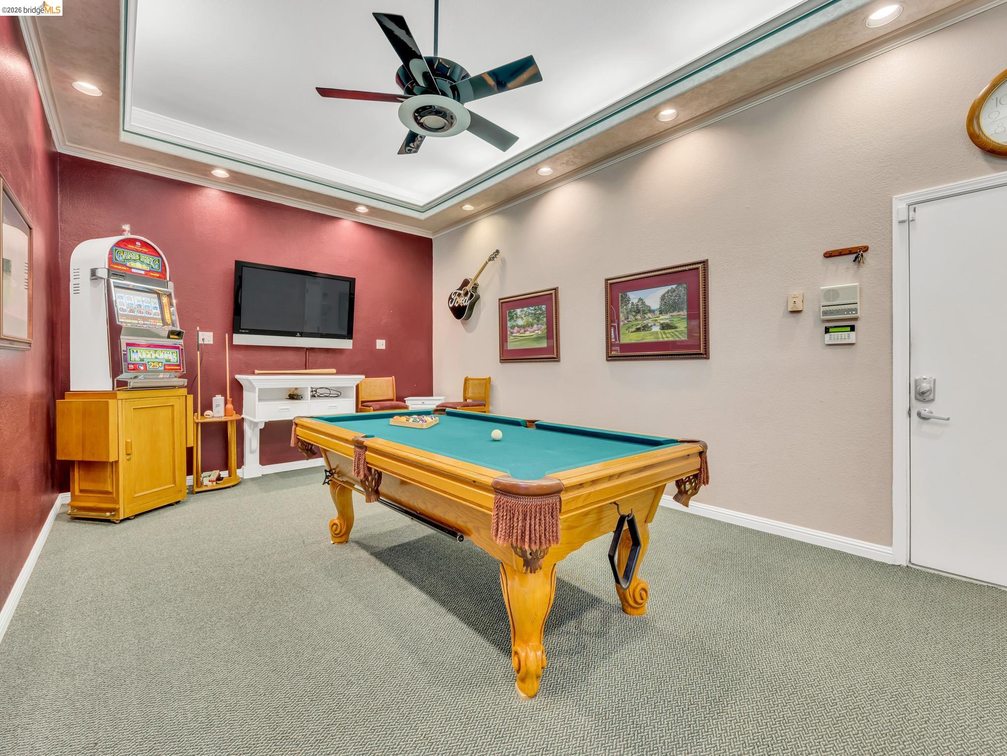 17035 Terminous Road Isleton, CA 95641 - Photo 37 of 48 Rec room with ceiling fan, carpet flooring, pool table, recessed lighting, and crown molding