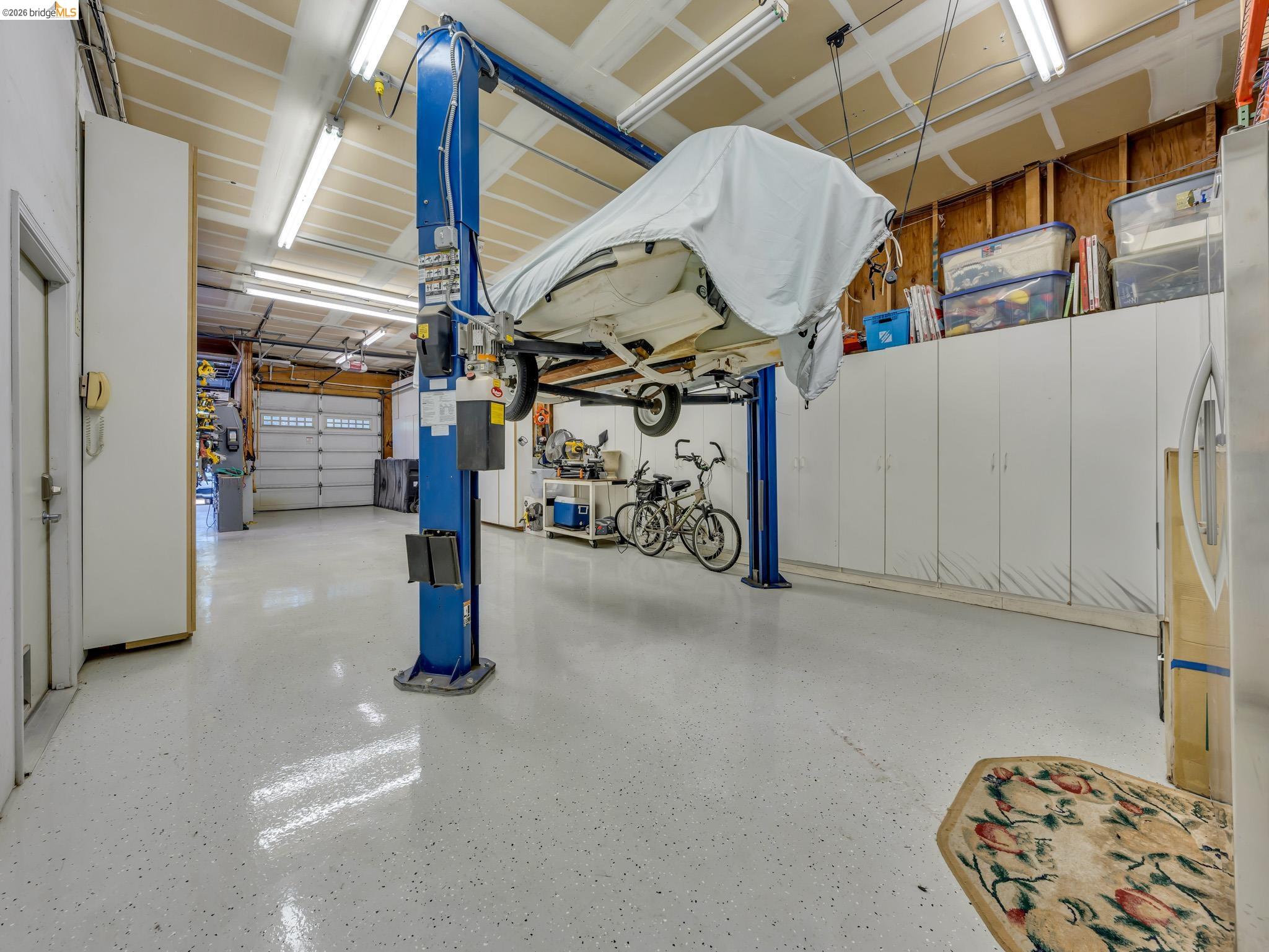 17035 Terminous Road Isleton, CA 95641 - Photo 45 of 48 Garage with freestanding refrigerator