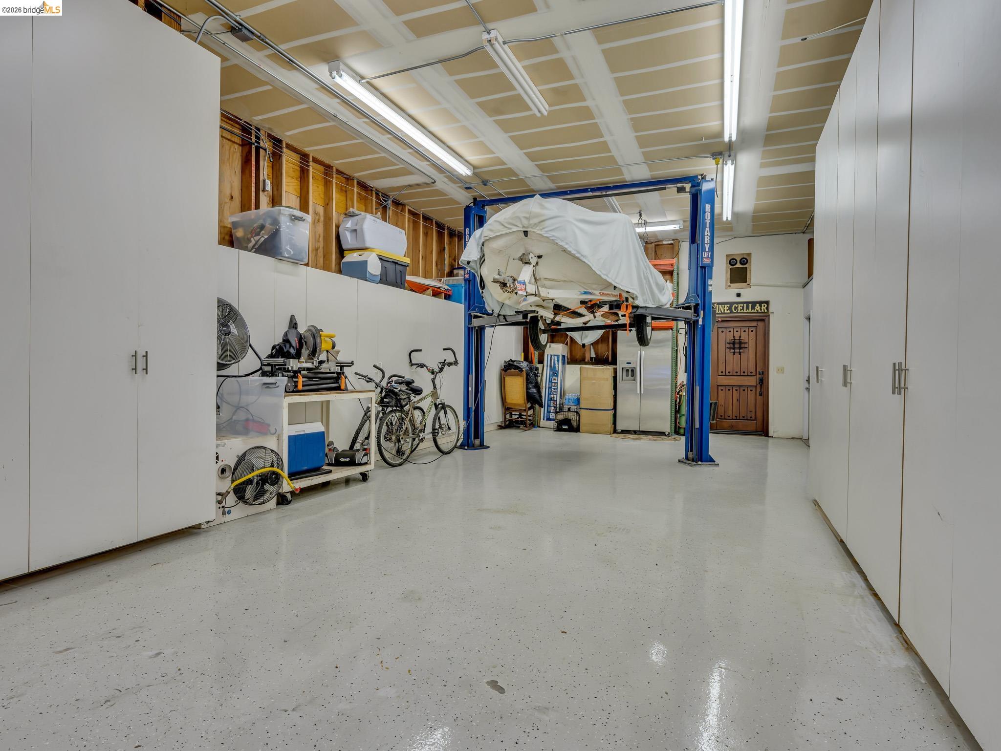 17035 Terminous Road Isleton, CA 95641 - Photo 46 of 48 Garage featuring stainless steel refrigerator with ice dispenser