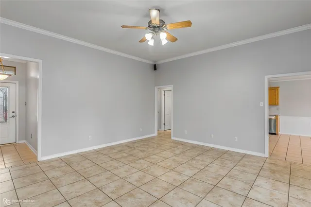 a view of a chandelier fan and closet