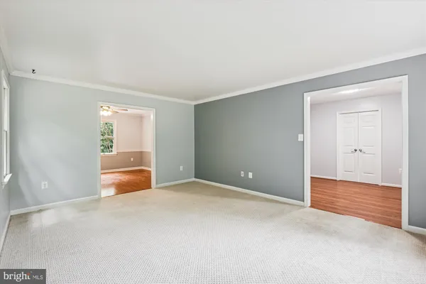 a view of an empty room and window