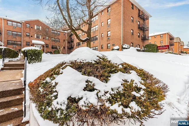 a view of city with tall buildings