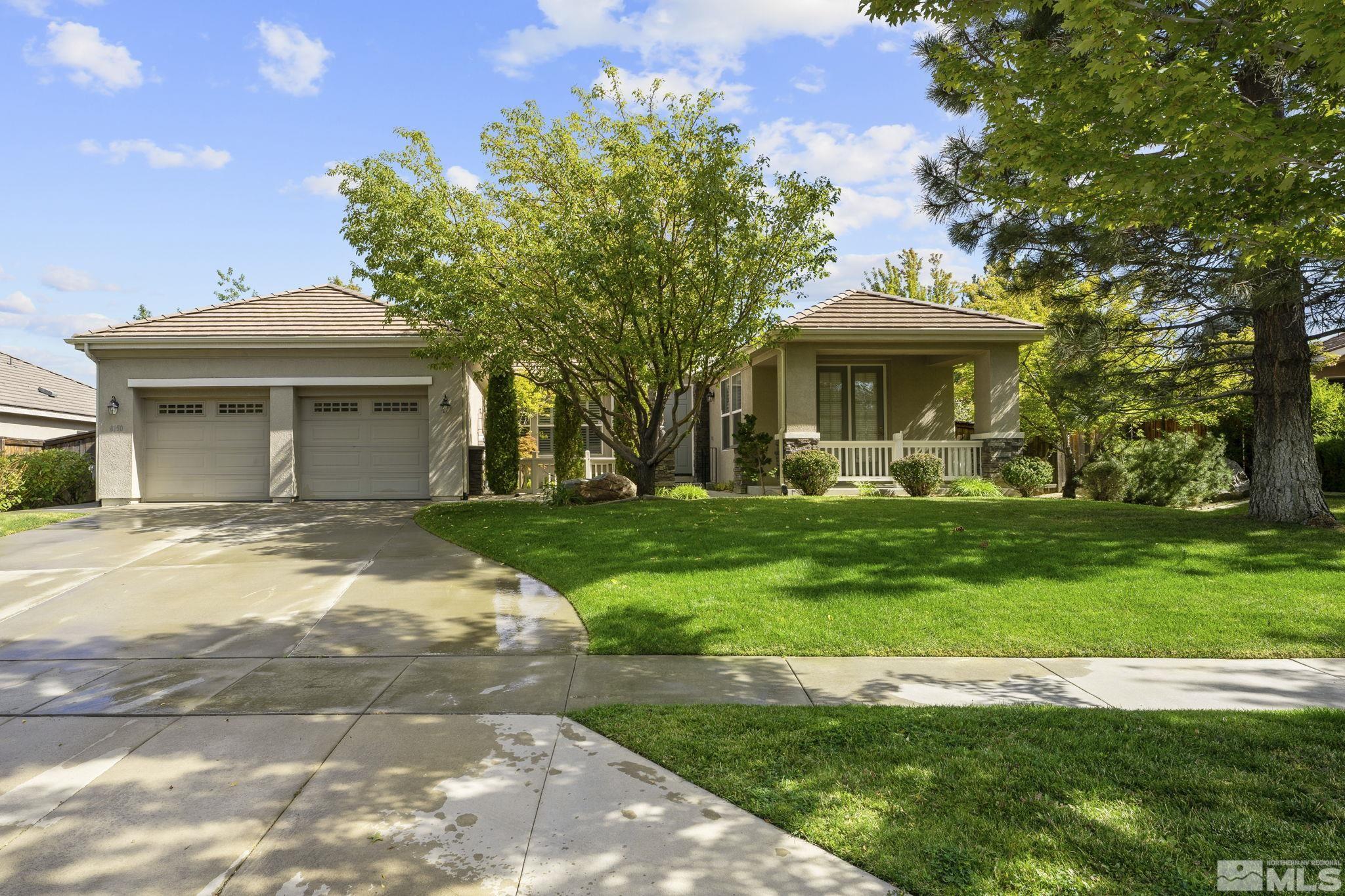 8150 Willow Ranch Trail Reno, NV 89523 - Photo 1 of 32 a front view of a house with garden