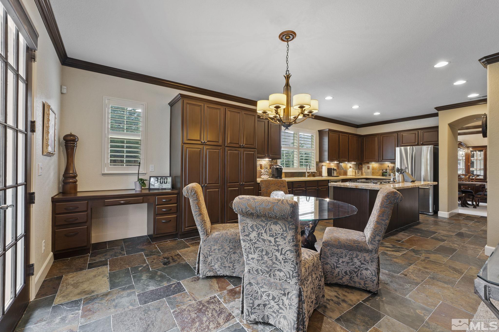 8150 Willow Ranch Trail Reno, NV 89523 - Photo 11 of 32 a dining room with furniture and window