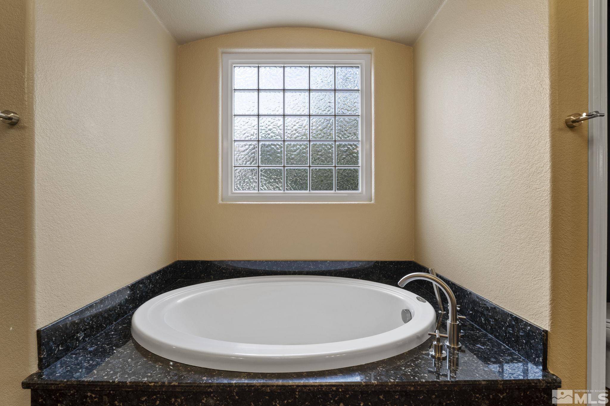 8150 Willow Ranch Trail Reno, NV 89523 - Photo 16 of 32 an empty room with a window