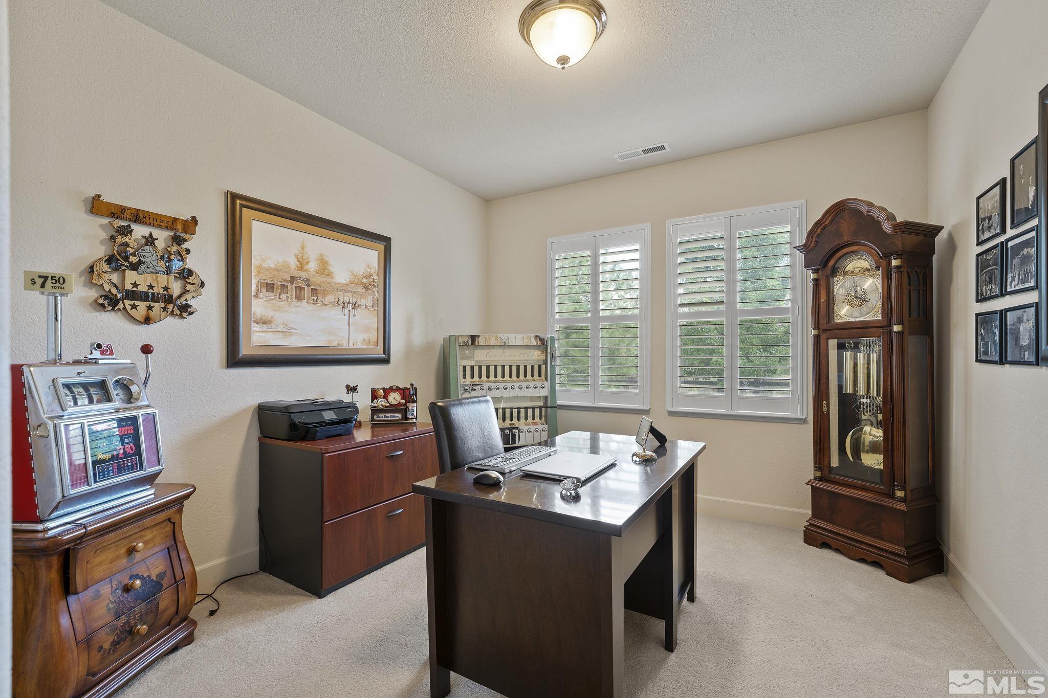 8150 Willow Ranch Trail Reno, NV 89523 - Photo 20 of 32 a view of a workspace with furniture and a window