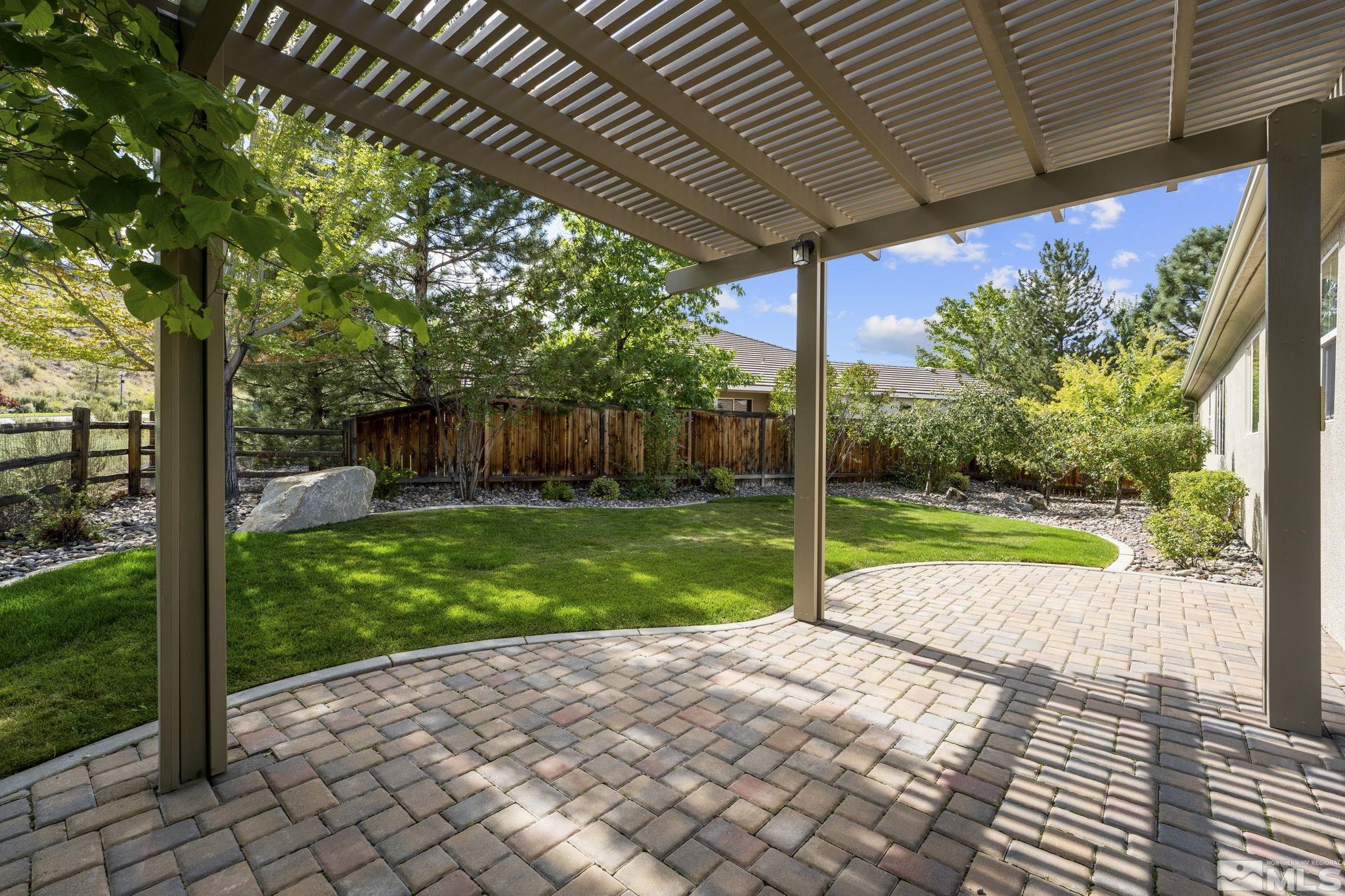 8150 Willow Ranch Trail Reno, NV 89523 - Photo 25 of 32 a view of a porch with a backyard