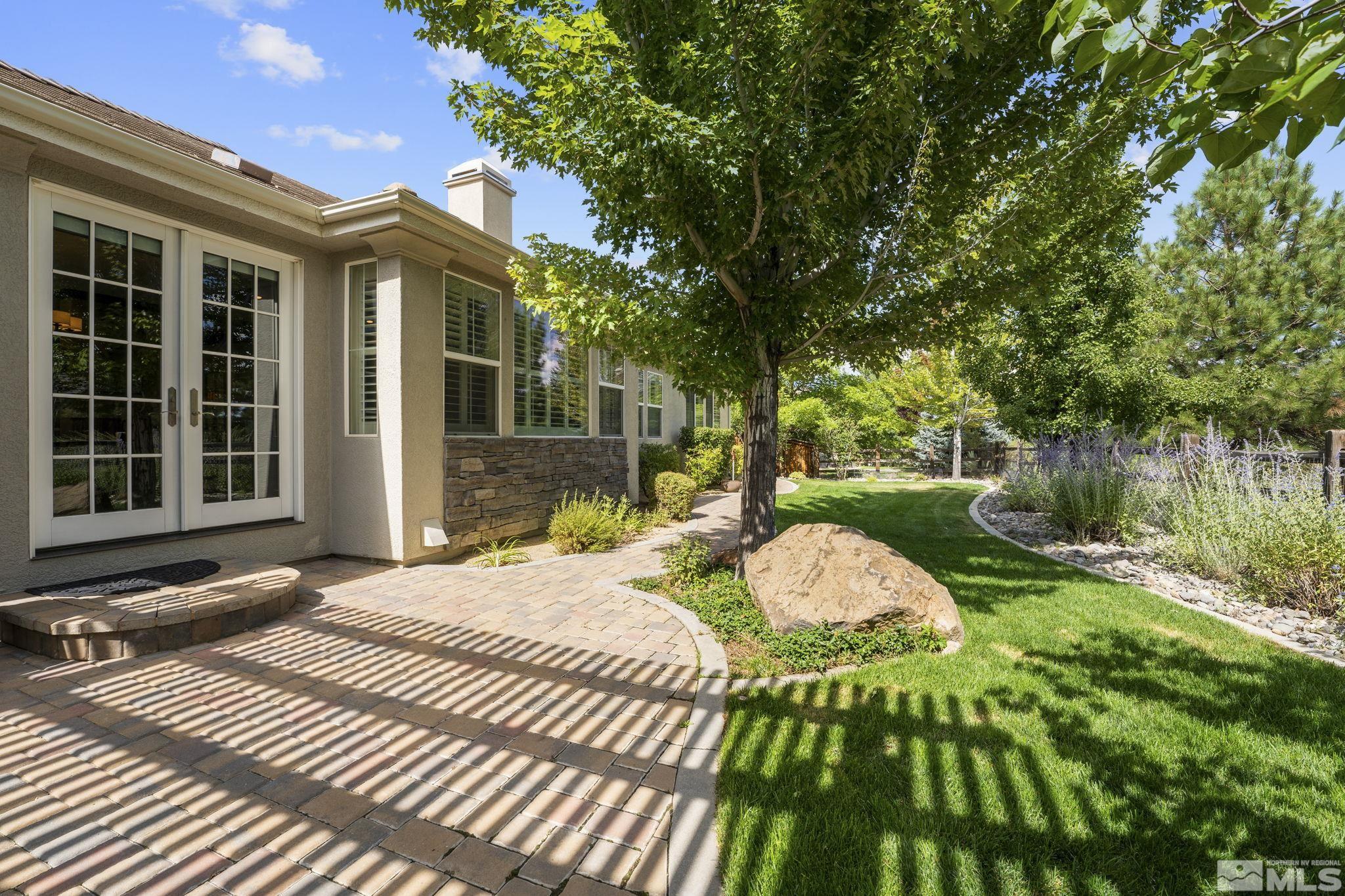 8150 Willow Ranch Trail Reno, NV 89523 - Photo 28 of 32 a view of a house with a yard