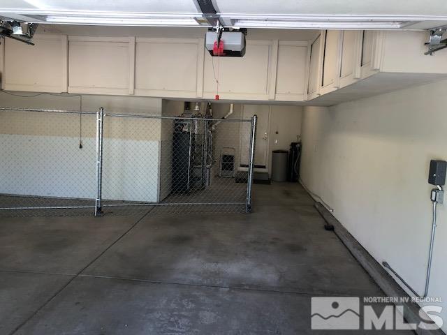8150 Willow Ranch Trail Reno, NV 89523 - Photo 31 of 32 a view of storage and utility room with two washing machine