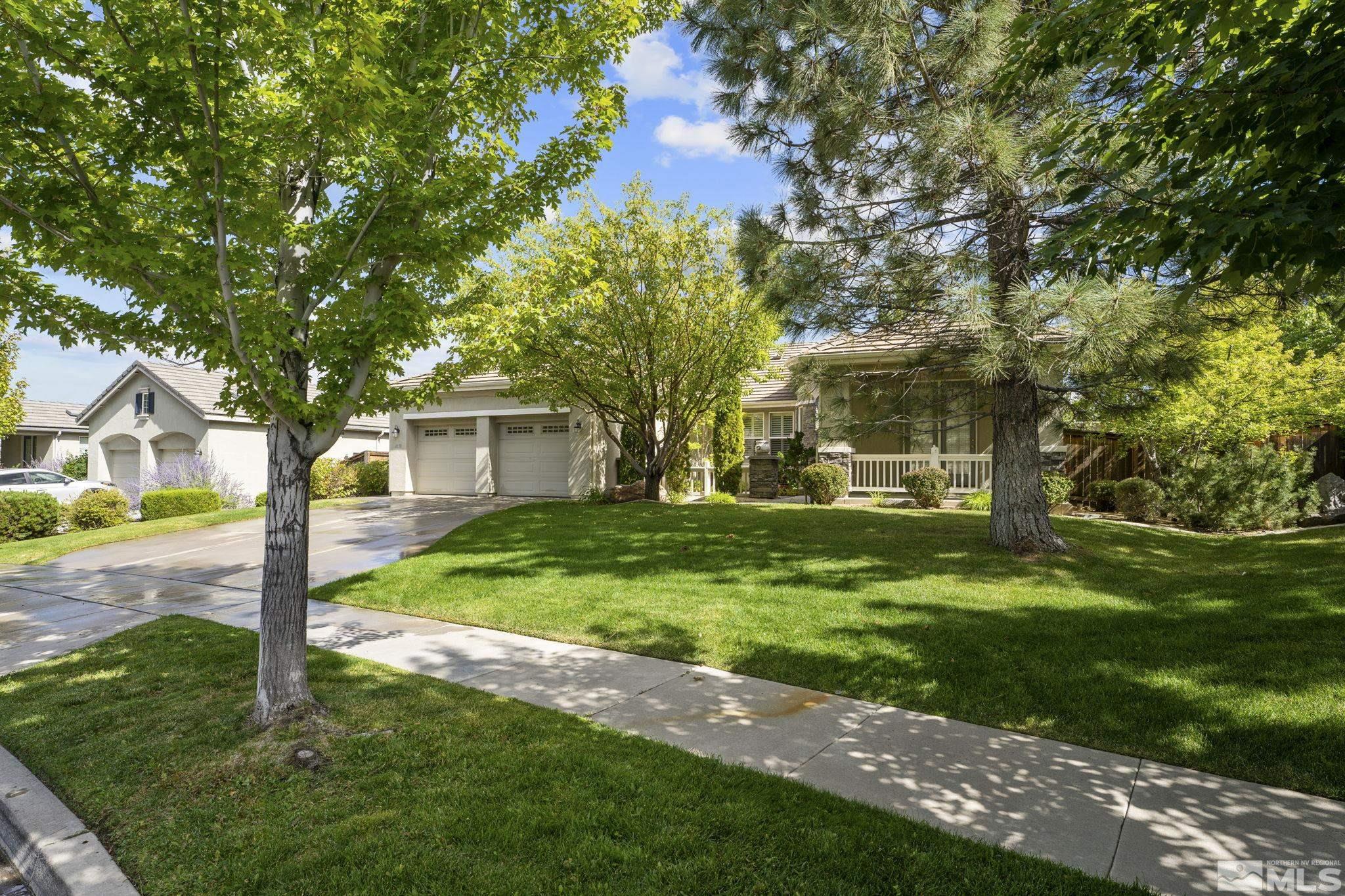 8150 Willow Ranch Trail Reno, NV 89523 - Photo 32 of 32 a view of a house with yard and tree s