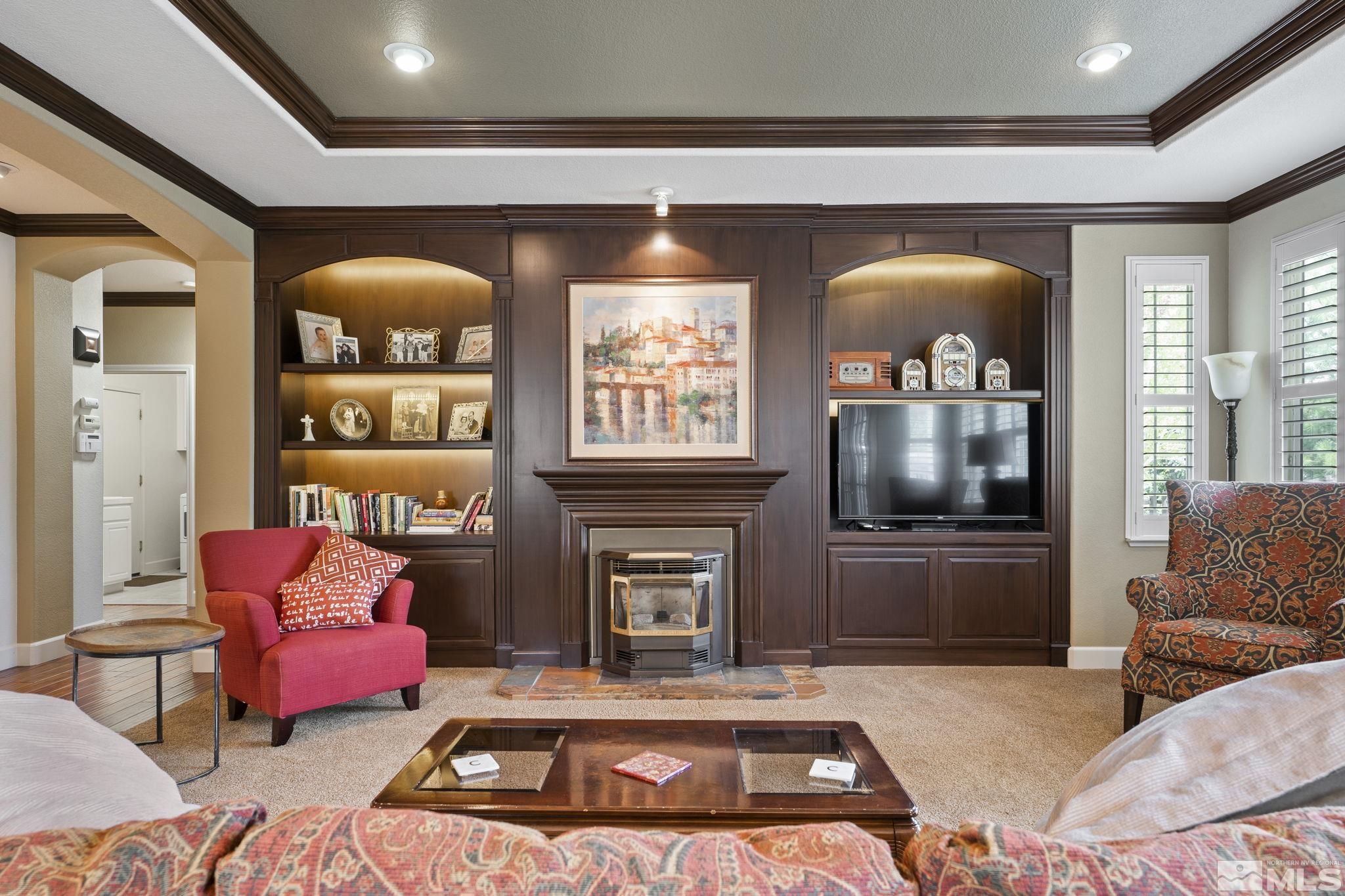 8150 Willow Ranch Trail Reno, NV 89523 - Photo 5 of 32 a living room with furniture and a flat screen tv