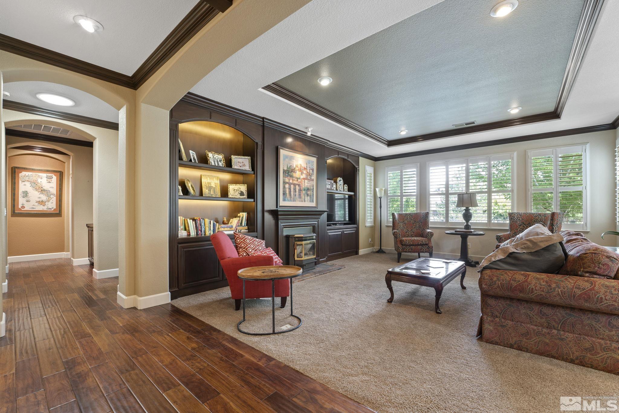 8150 Willow Ranch Trail Reno, NV 89523 - Photo 6 of 32 a living room with furniture and a wooden floor