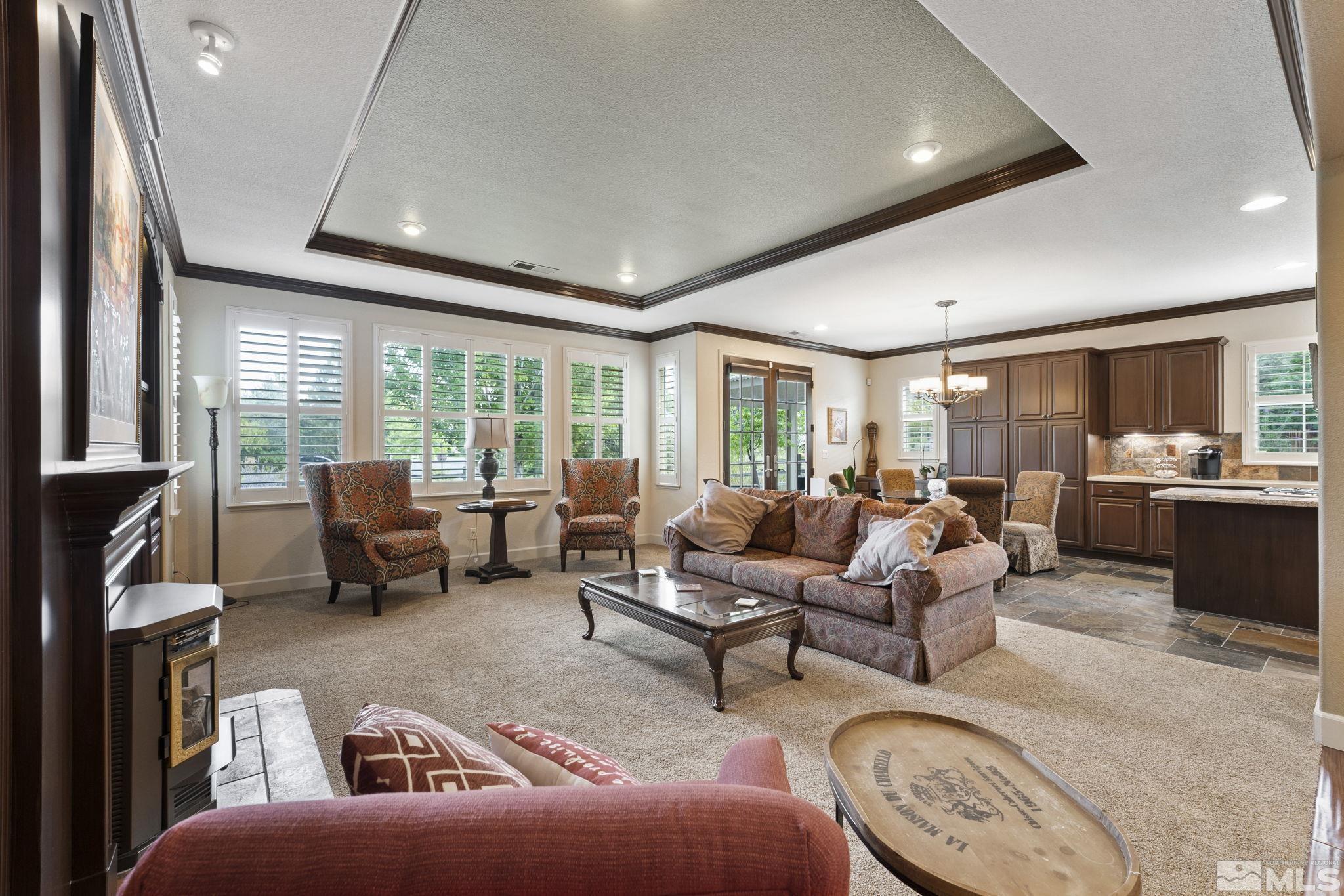 8150 Willow Ranch Trail Reno, NV 89523 - Photo 7 of 32 a living room with furniture and a large window