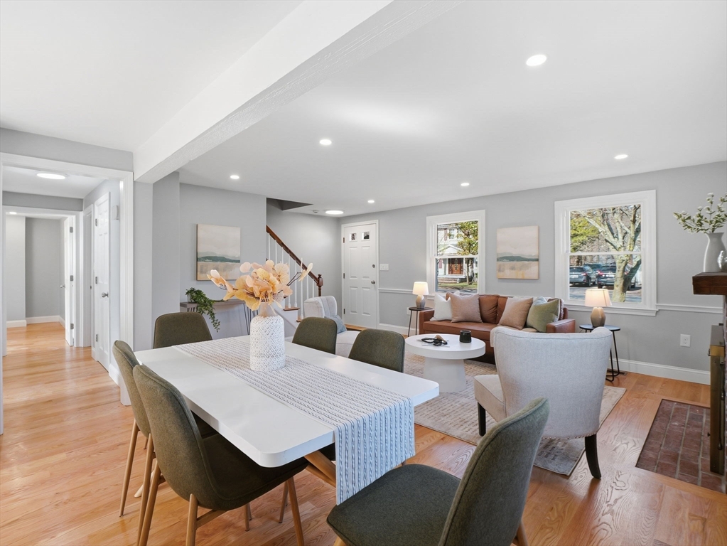 58 Maple Street Framingham, MA 01702 - Photo 3 of 35 a living room with furniture a wooden floor and a large window