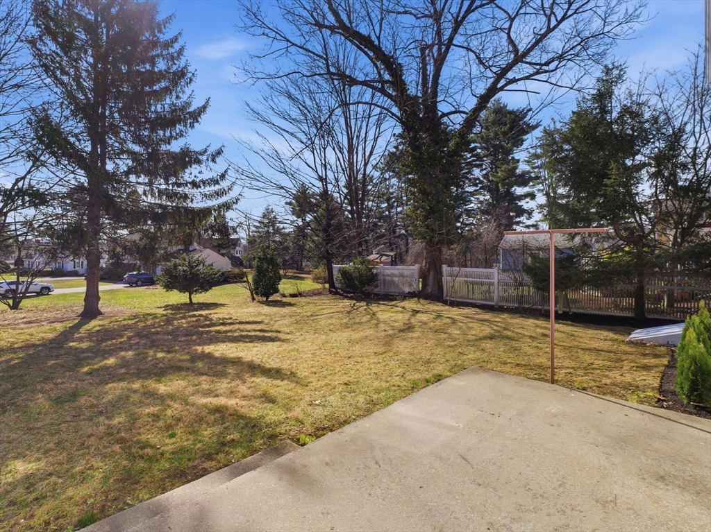 58 Maple Street Framingham, MA 01702 - Photo 32 of 35 a view of yard with swimming pool