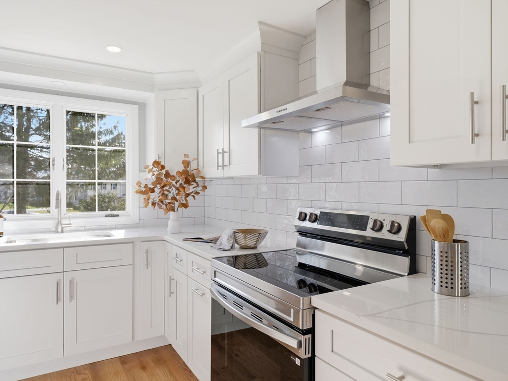 58 Maple Street Framingham, MA 01702 - Photo 6 of 35 a kitchen with a sink and cabinets