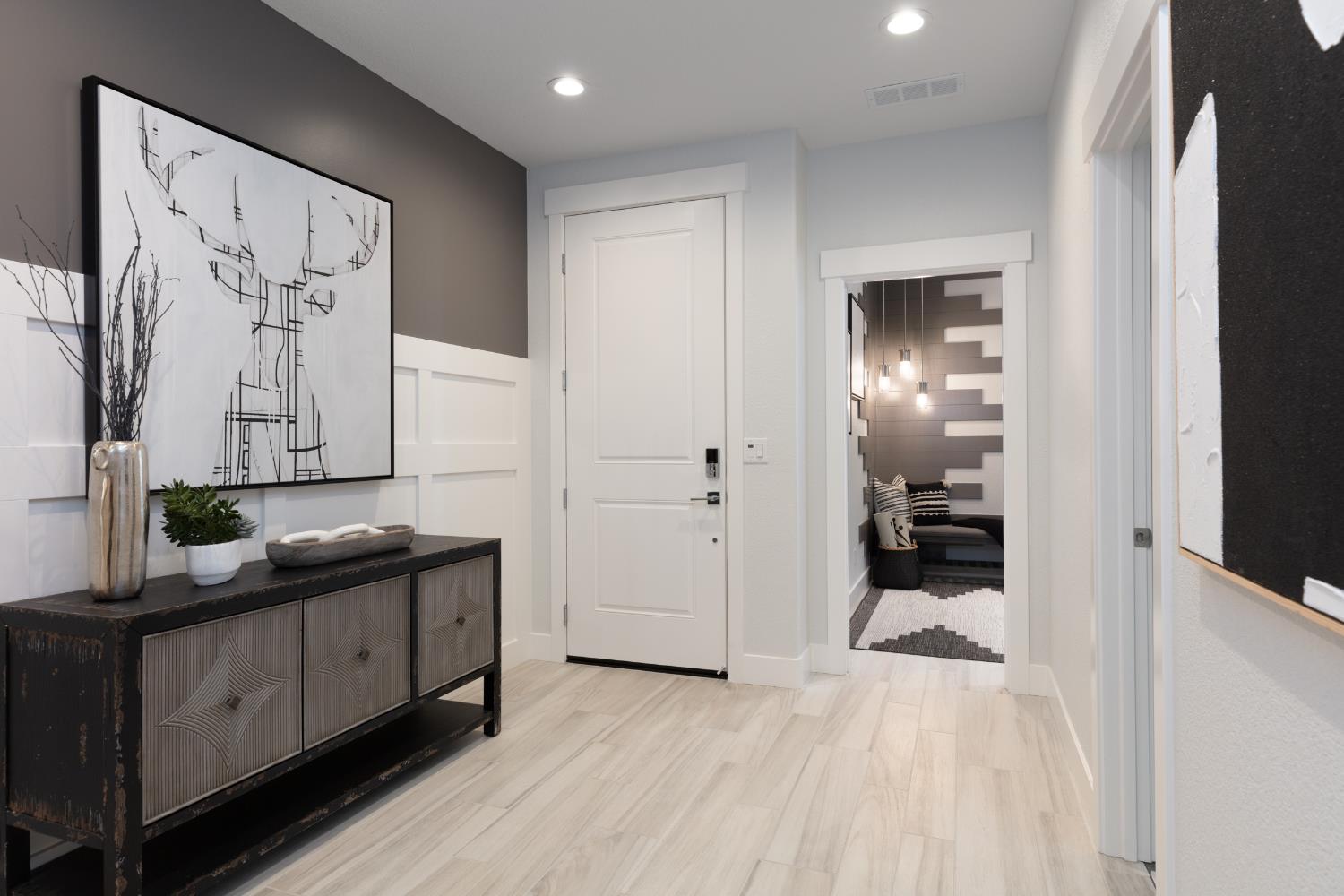 12704 Castaic Lk Way Rancho Cordova, CA 95742 - Photo 2 of 13 a hallway with mirror on the wall