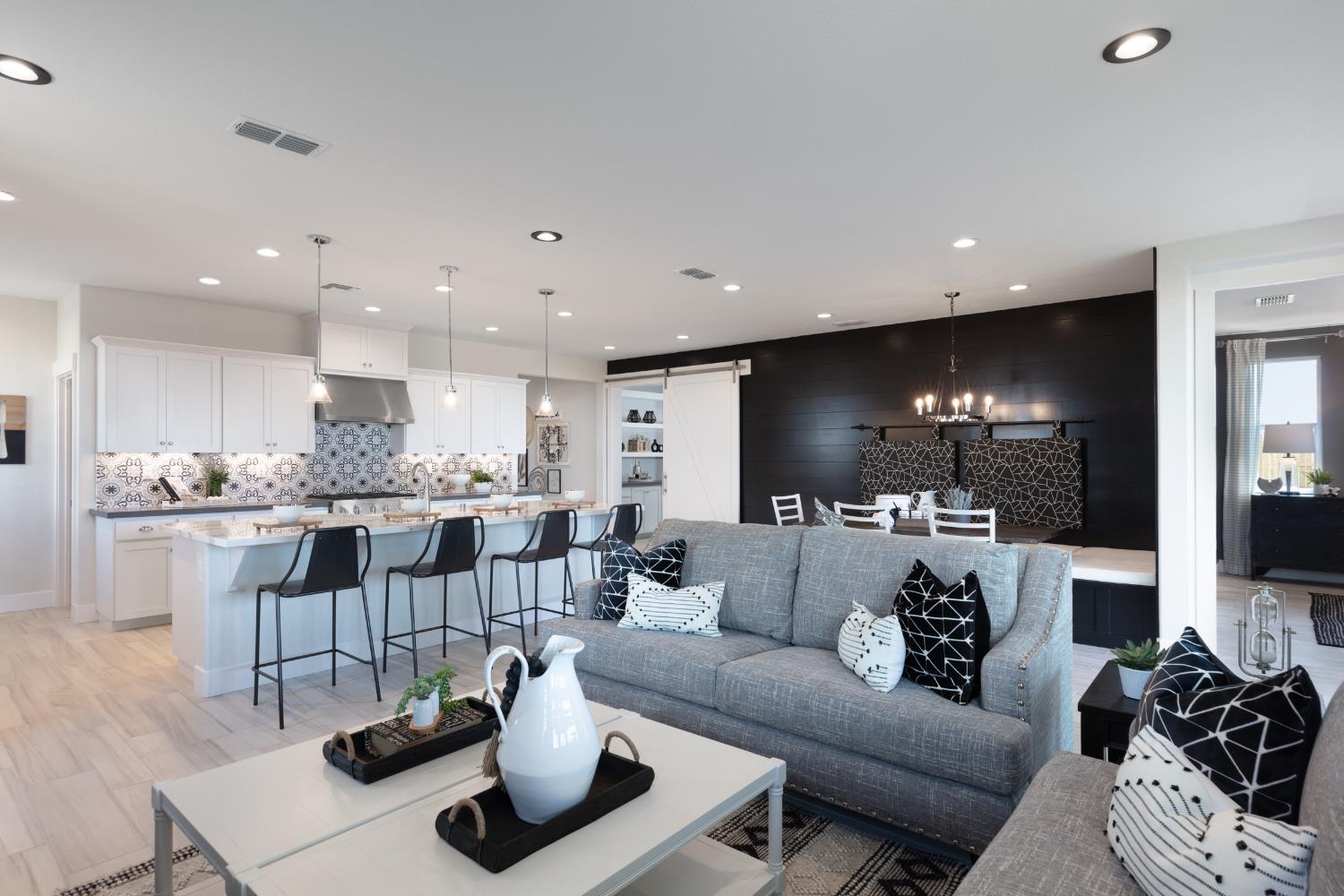 12704 Castaic Lk Way Rancho Cordova, CA 95742 - Photo 7 of 13 a living room with furniture and a view of kitchen