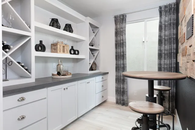 a bathroom with a sink a mirror and a toilet