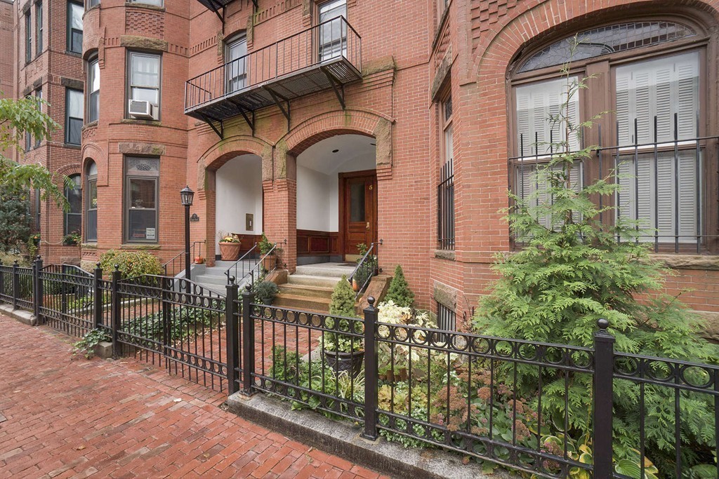 5 Durham Street, Unit 2 Boston, MA 02115 - Photo 22 of 22 front view of house with a small yard