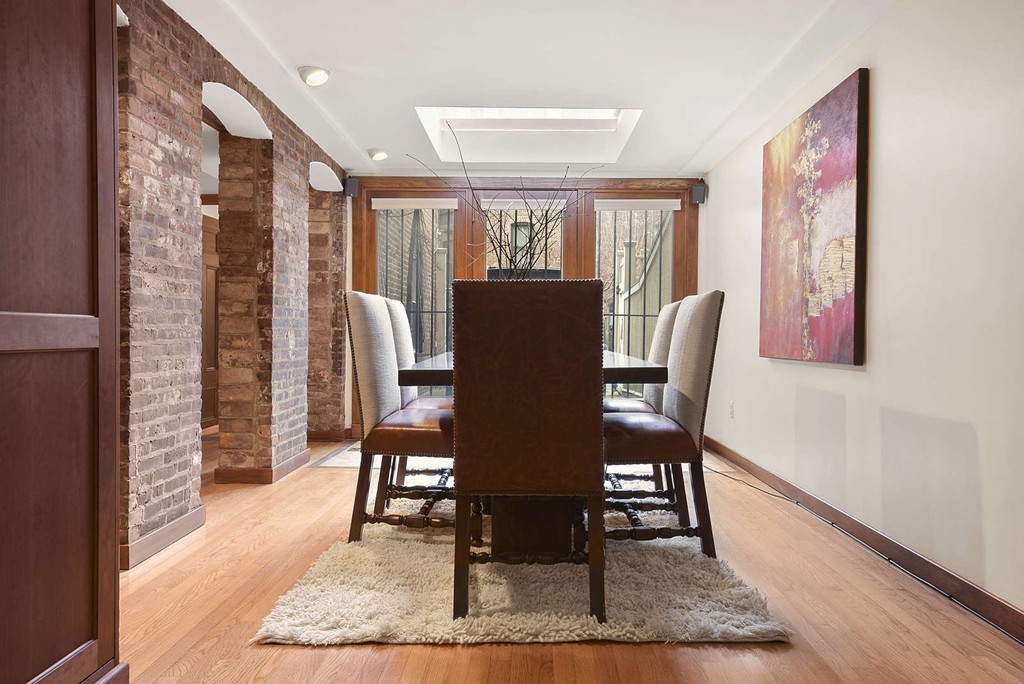 5 Durham Street, Unit 2 Boston, MA 02115 - Photo 10 of 22 a view of a dining room with furniture window and wooden floor