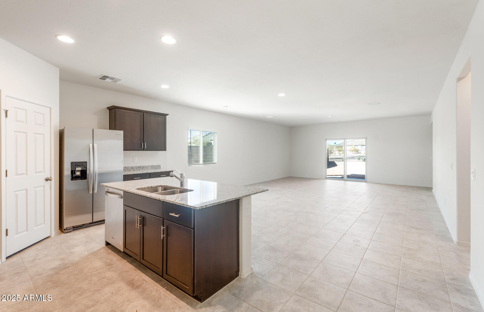 25468 West Chipman Road Buckeye, AZ 85326 - Photo 6 of 19 5 - Kitchen and Gathering Room