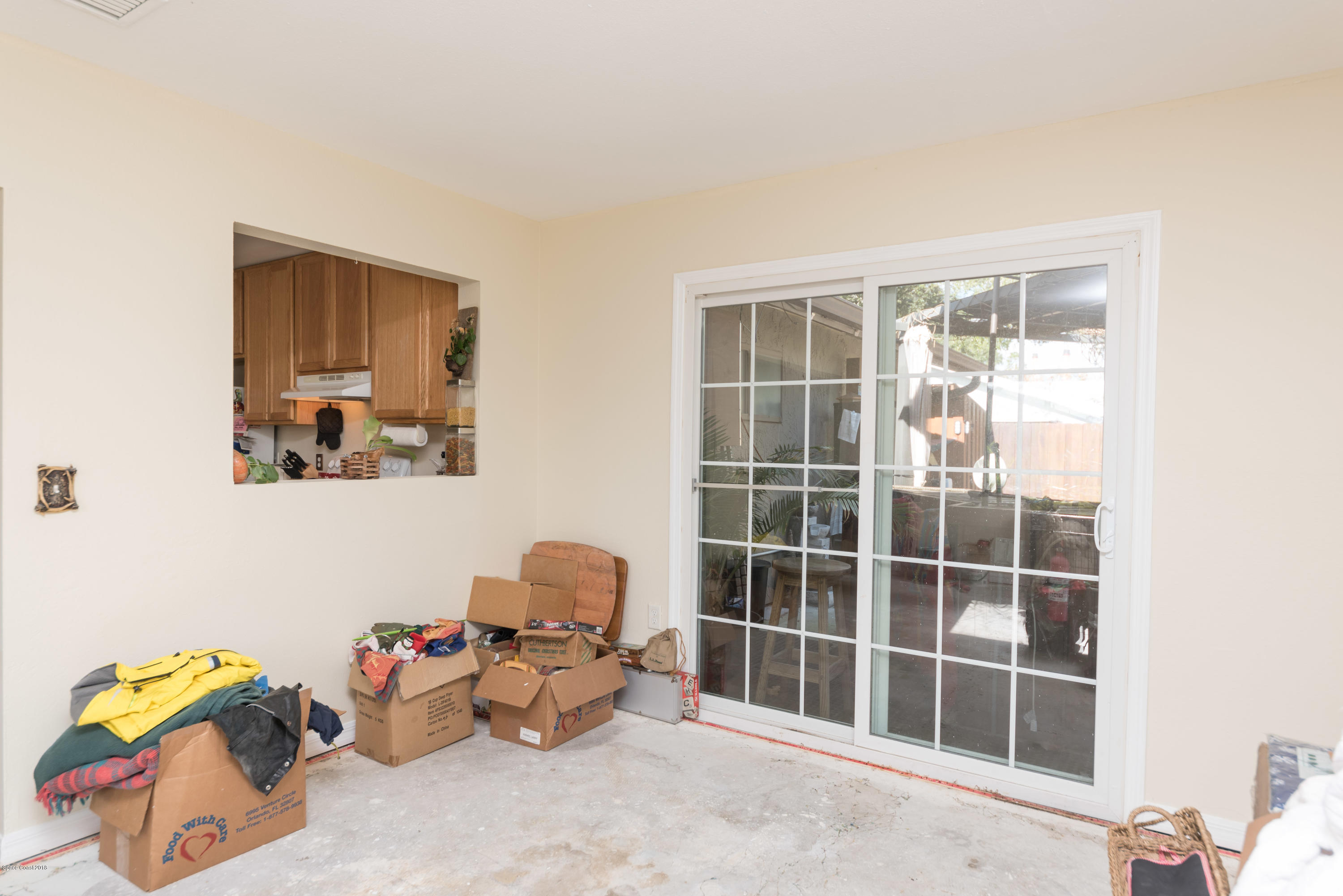 253 Chase Road Cocoa, FL 32927 - Photo 15 of 22 a view of a room with toys and a window