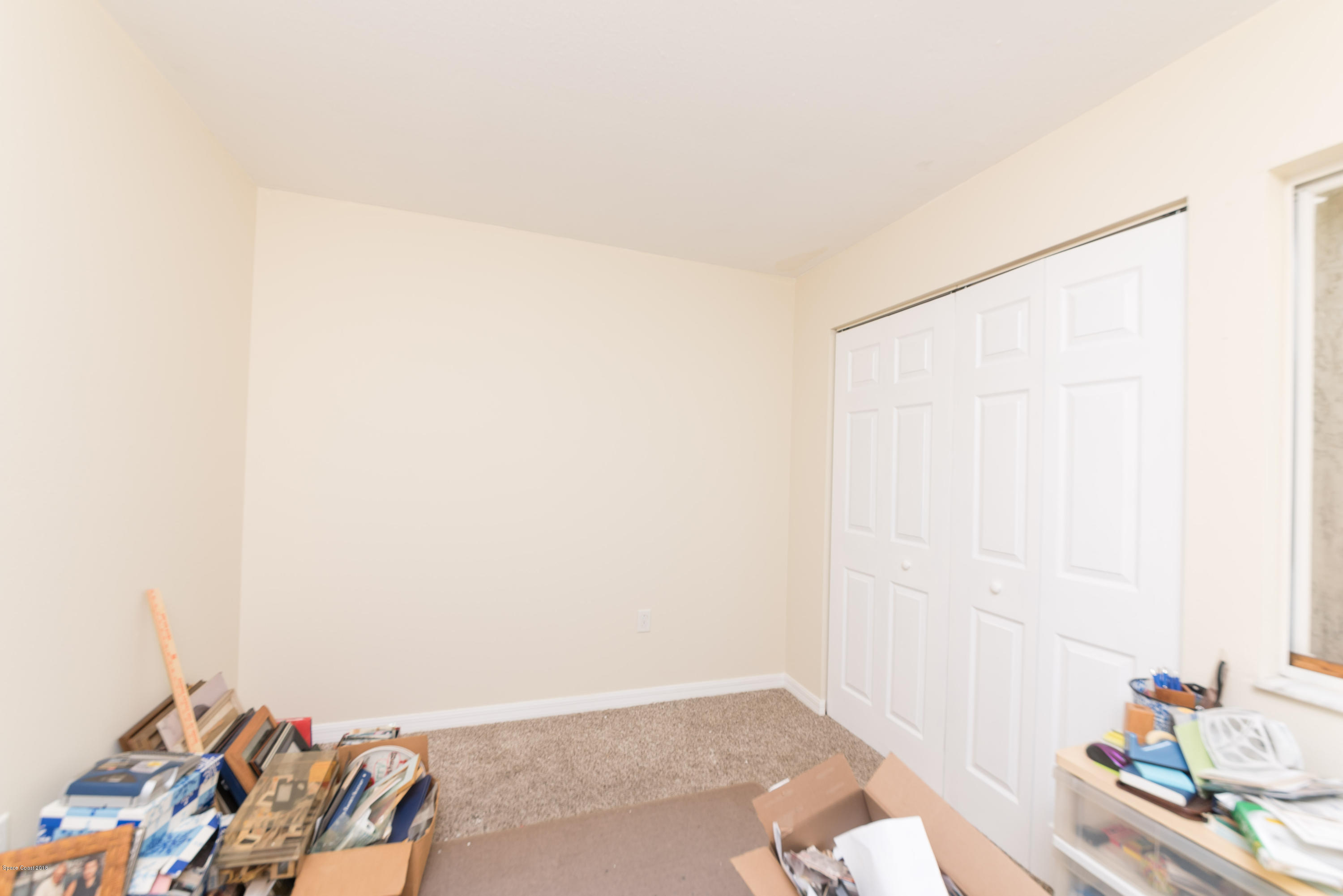 253 Chase Road Cocoa, FL 32927 - Photo 19 of 22 a view of a room with rack on the wall