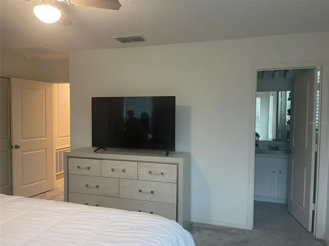 a bathroom with a toilet and a sink
