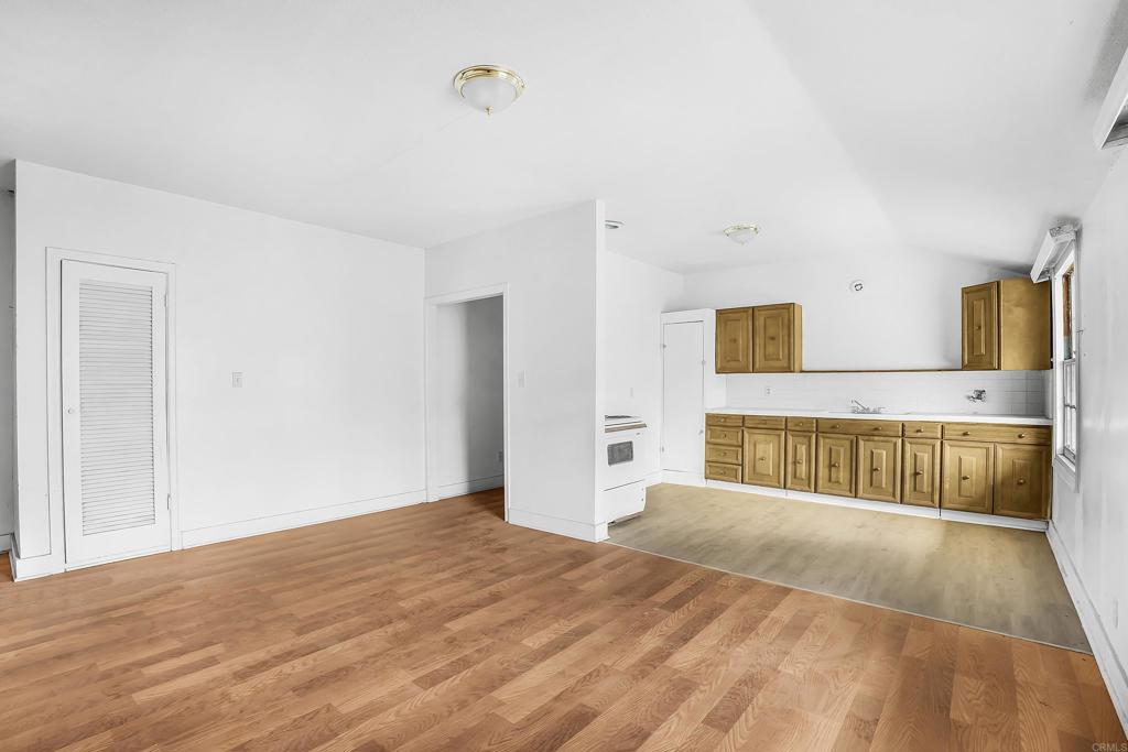 431 Jeb Stuart Road Campo, CA 91906 - Photo 11 of 33 a view of a bedroom with wooden floor and a bed