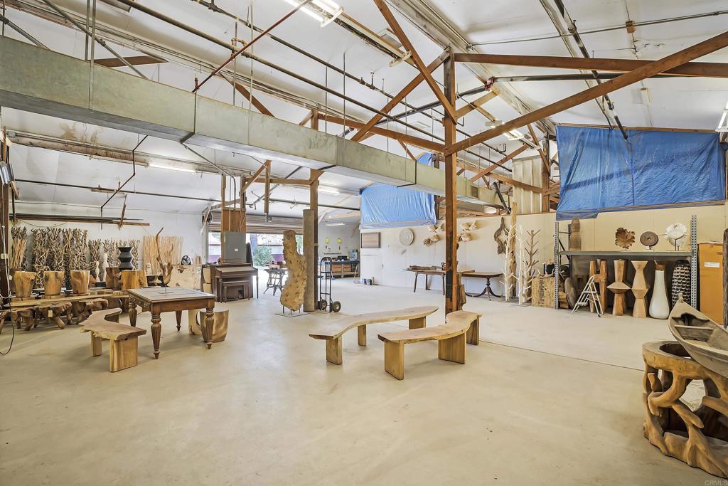 431 Jeb Stuart Road Campo, CA 91906 - Photo 24 of 33 a living room with lots of furniture and a chandelier