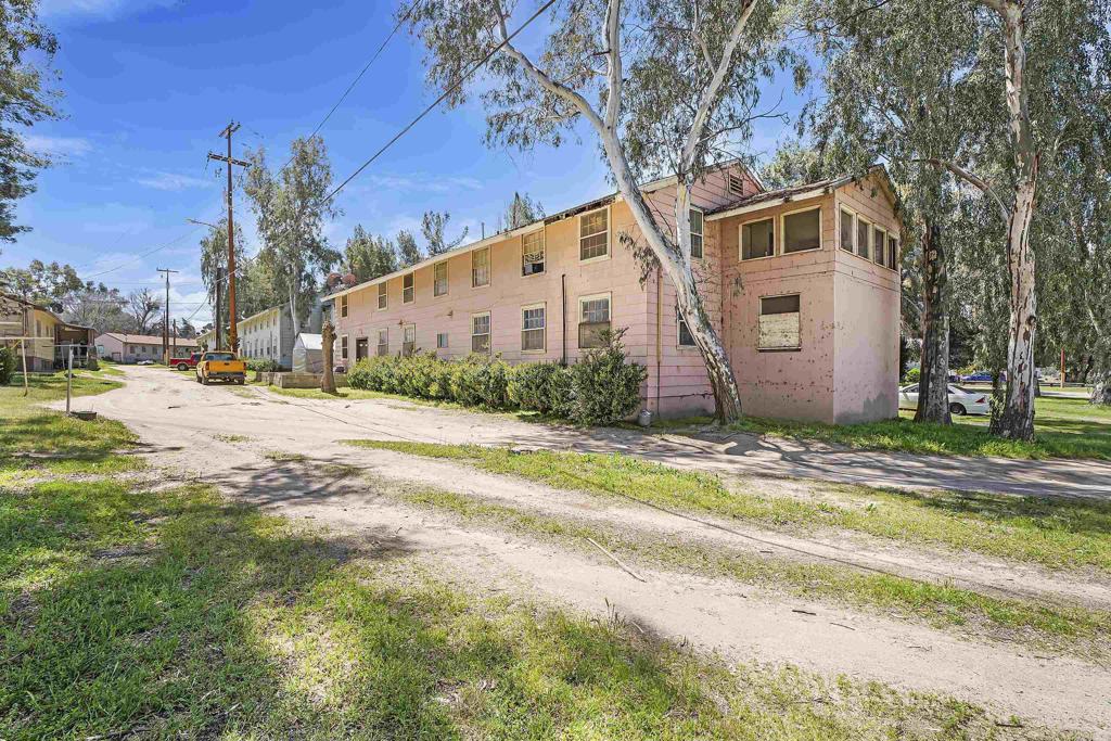 431 Jeb Stuart Road Campo, CA 91906 - Photo 29 of 33 a view of a white house with a big yard and large trees