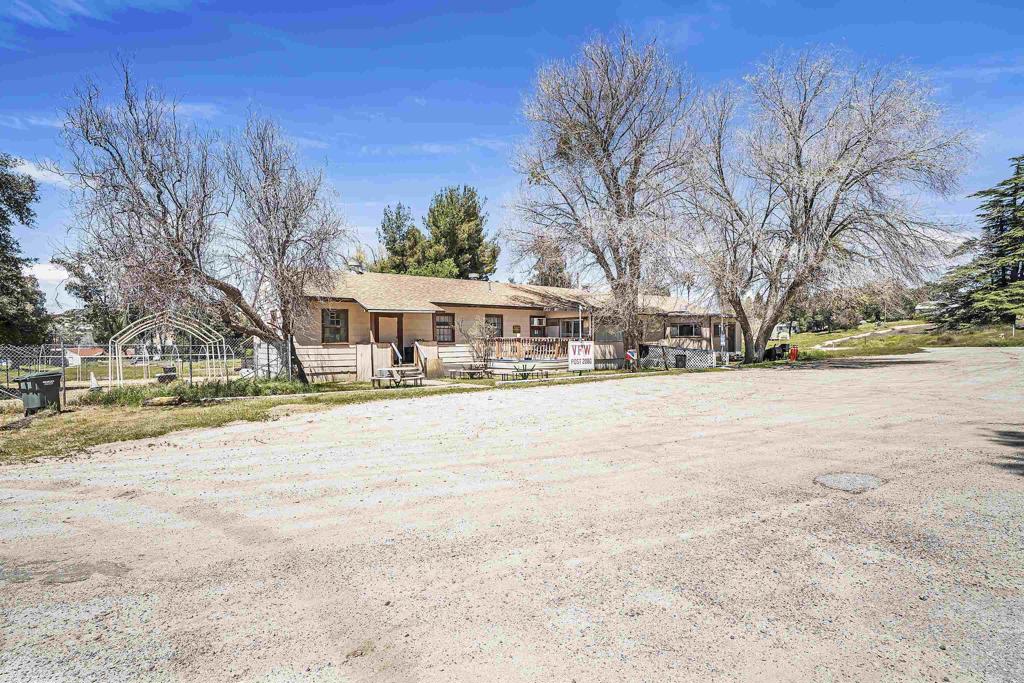 431 Jeb Stuart Road Campo, CA 91906 - Photo 31 of 33 a front view of house with yard and trees
