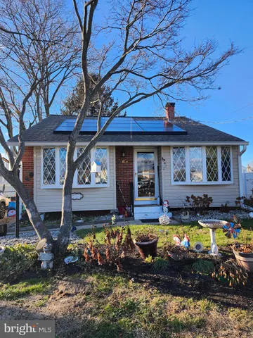 a view of a house with swimming pool and porch