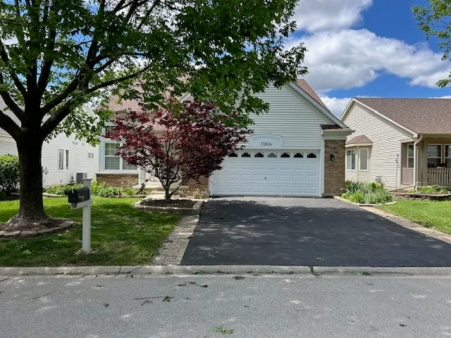a house with a tree in front of it