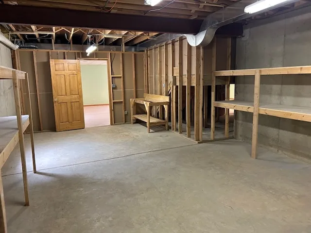 a room with furniture and a book shelf