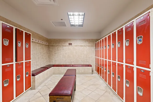 a view of a car park in front of a house with a yard