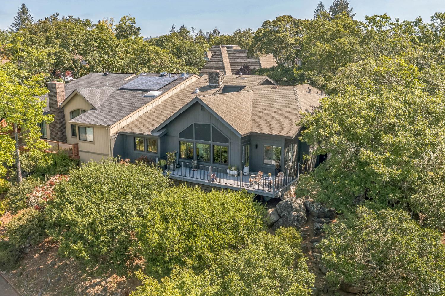 3207 Broken Twig Lane Santa Rosa, CA 95404 - Photo 1 of 1 a aerial view of a house with swimming pool and next to a yard